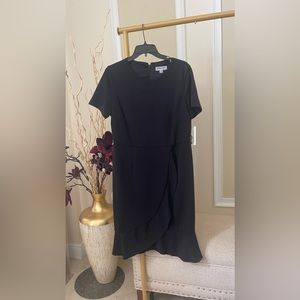 New black dress with tag crepe fabric very sliming